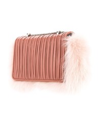 Розовая меховая сумка через плечо от Les Petits Joueurs