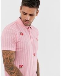 Мужская розовая футболка-поло с принтом от ASOS DESIGN
