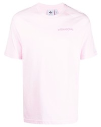 Мужская розовая футболка-поло от adidas