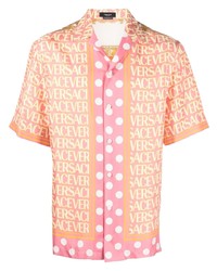 Мужская розовая шелковая рубашка с коротким рукавом в горошек от Versace