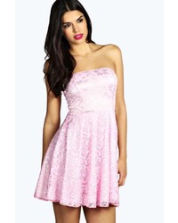 Розовое кружевное платье с плиссированной юбкой