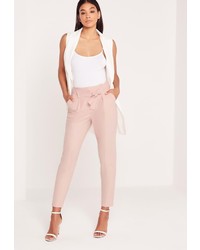 Розовые брюки со складками