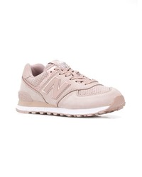 Женские розовые замшевые низкие кеды от New Balance