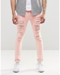 Розовые зауженные джинсы