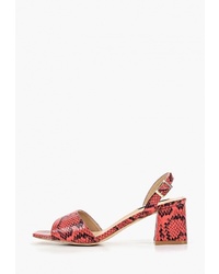Розовые кожаные босоножки на каблуке со змеиным рисунком от LOST INK