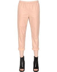 Розовые кожаные брюки