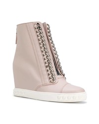 Розовые кожаные кроссовки на танкетке от Casadei