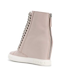 Розовые кожаные кроссовки на танкетке от Casadei