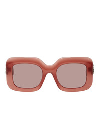 Женские розовые солнцезащитные очки от Loewe