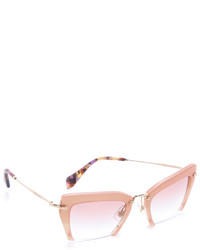 Женские розовые солнцезащитные очки от Miu Miu