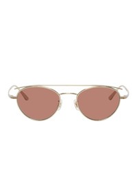 Мужские розовые солнцезащитные очки от Oliver Peoples The Row