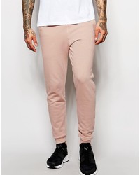 Розовые спортивные штаны