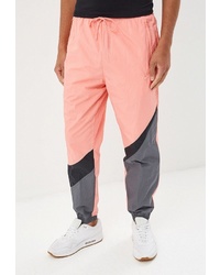 Мужские розовые спортивные штаны с принтом от Nike