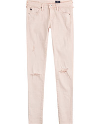 Розовые хлопковые рваные джинсы скинни