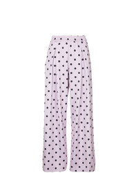 Розовые широкие брюки в горошек