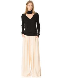 Розовые широкие брюки от Tome