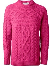 Розовый вязаный свитер