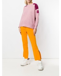 Женский розовый вязаный свитер от Moncler