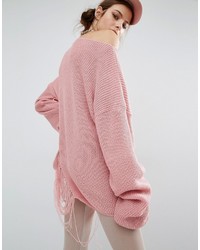Розовый вязаный свободный свитер