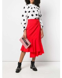 Розовый кожаный клатч с принтом от Moschino