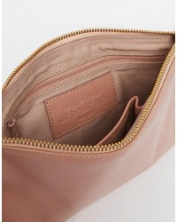 Розовый кожаный клатч от Urban Code