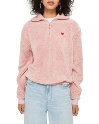 Розовый свитер с воротником на молнии