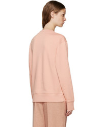 Женский розовый свитер от Acne Studios