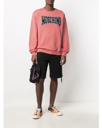 Мужской розовый свитшот с принтом от Moschino