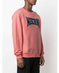 Мужской розовый свитшот с принтом от Moschino