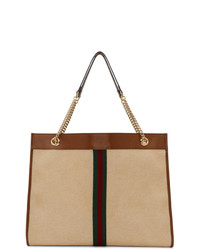 Светло-коричневая большая сумка из плотной ткани в вертикальную полоску от Gucci