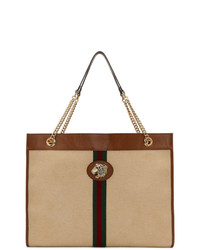 Светло-коричневая большая сумка из плотной ткани в вертикальную полоску от Gucci