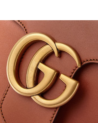 Светло-коричневая кожаная сумка почтальона от Gucci