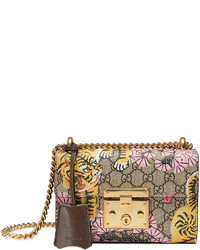 Женская светло-коричневая кожаная сумка с принтом от Gucci