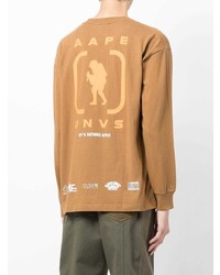 Мужская светло-коричневая футболка с длинным рукавом с принтом от AAPE BY A BATHING APE
