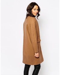 Женское светло-коричневое пальто от Sessun