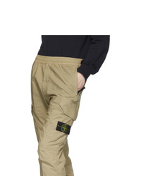 Светло-коричневые брюки карго от Stone Island