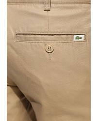 Светло-коричневые брюки чинос от Lacoste