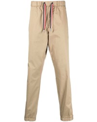 Светло-коричневые брюки чинос от Moncler