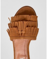 Светло-коричневые замшевые сандалии на плоской подошве c бахромой от Dune