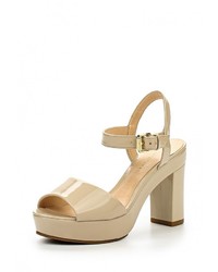 Светло-коричневые кожаные босоножки на каблуке от Lilly's Closet