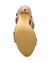 Светло-коричневые кожаные босоножки на каблуке от Spurr