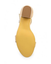 Светло-коричневые кожаные босоножки на каблуке от Spurr