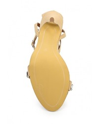 Светло-коричневые кожаные босоножки на каблуке от Spurr