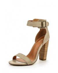 Светло-коричневые кожаные босоножки на каблуке от Spurr