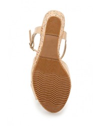 Светло-коричневые кожаные босоножки на танкетке от Anesia