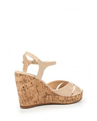 Светло-коричневые кожаные босоножки на танкетке от Anesia