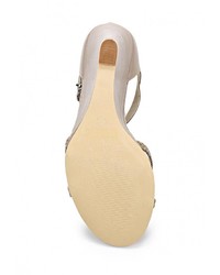 Светло-коричневые кожаные босоножки на танкетке от Betsy