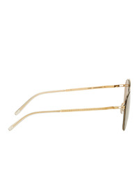 Мужские светло-коричневые солнцезащитные очки от Maison Margiela