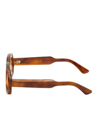 Мужские светло-коричневые солнцезащитные очки от Gucci