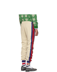 Мужские светло-коричневые спортивные штаны в вертикальную полоску от Gucci